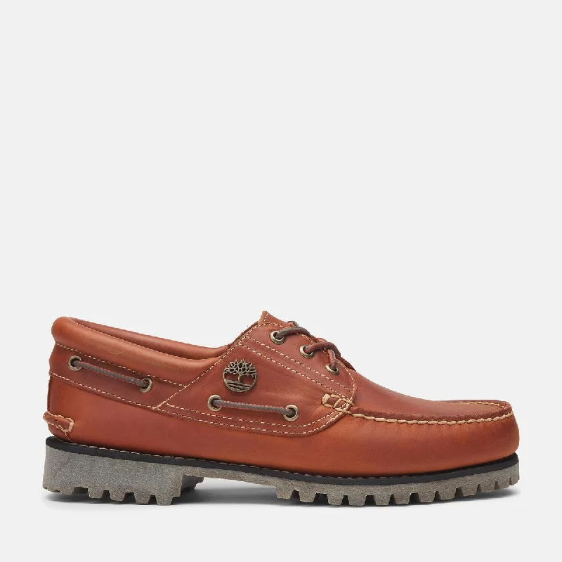 Men's boat shoes in a two - tone color schemeMen's Authentic 3-Eye Classic Lug