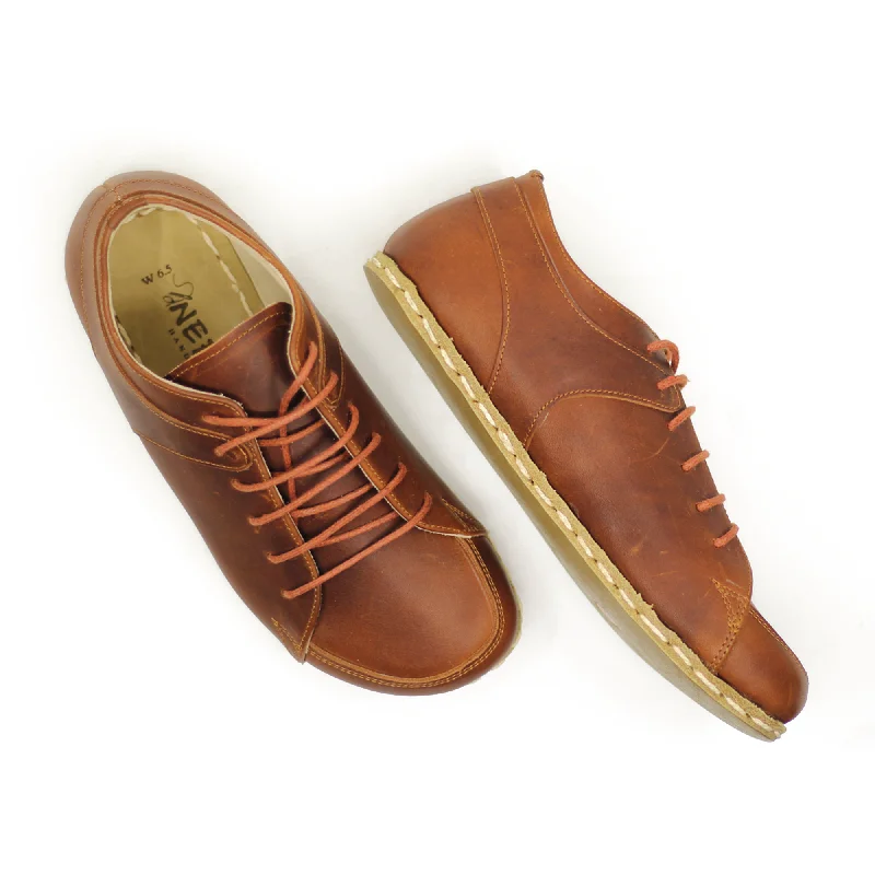 Men's fashion - forward sneakers with a unique tongue designMen's Copper Rivet Earthing Leather Sneaker in Crazy New Brown