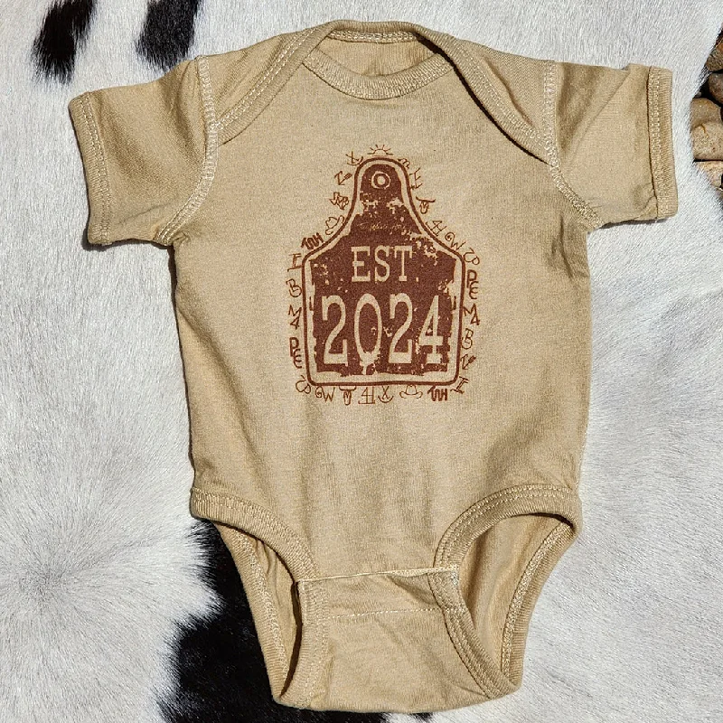 Men's western boots with a concho - studded strap and a pointed toeEstablished 2024 Onesie